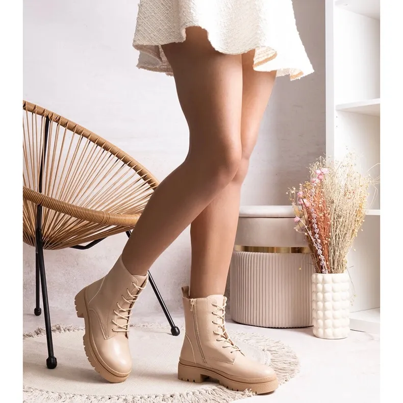 Beige insulated classic ankle boots by Edmund