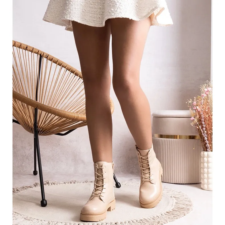 Beige insulated classic ankle boots by Edmund